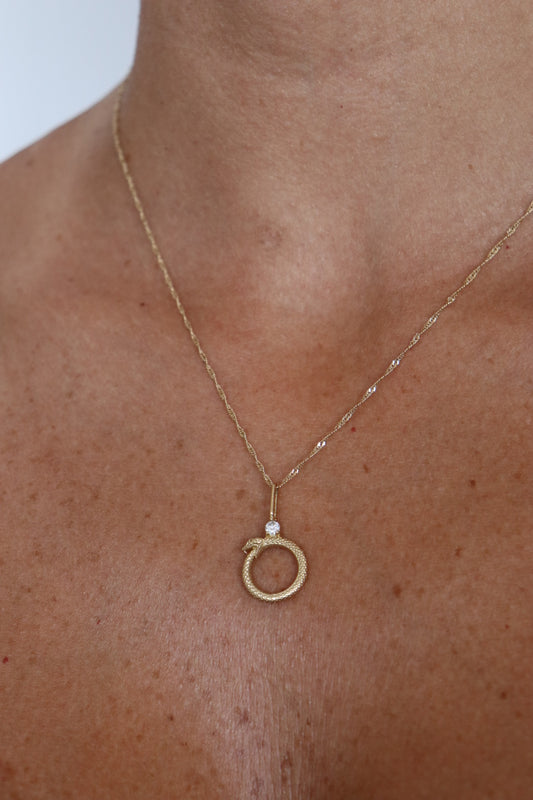 Ouroboros oro 10k diamante natural