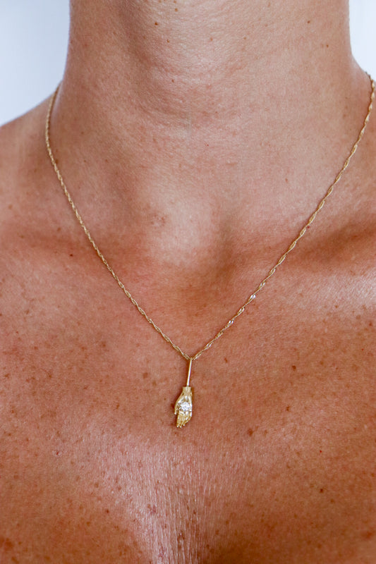 Mano de protección oro 10k diamante natural