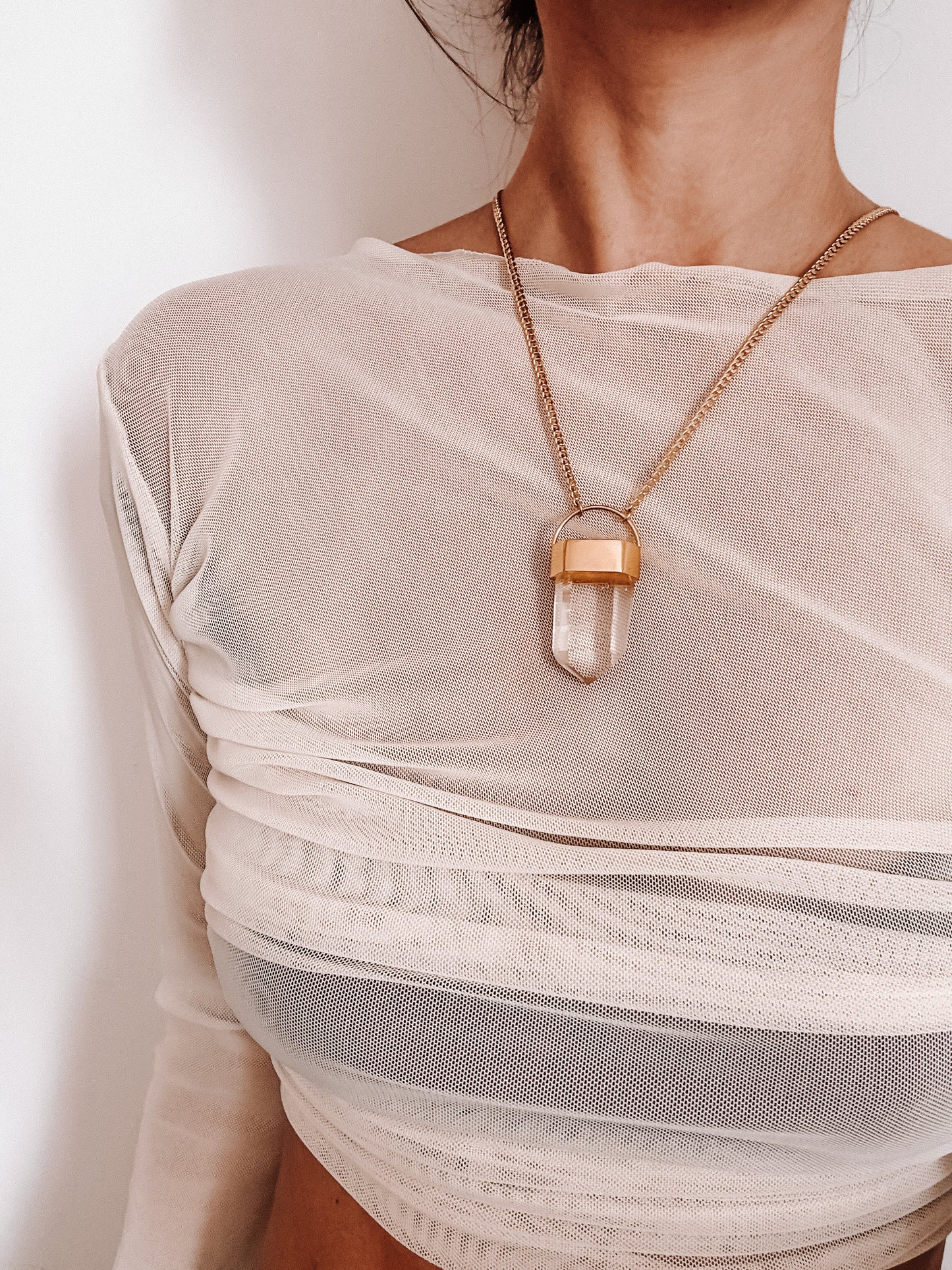 Amuleto cuarzo traslucido