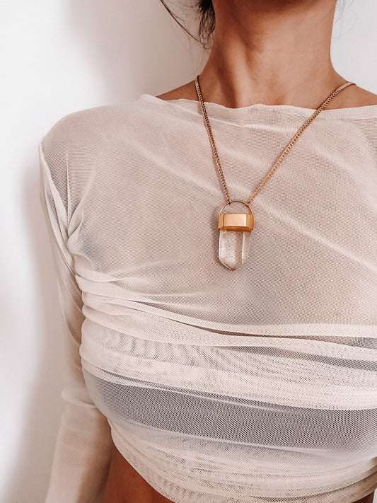 Amuleto cuarzo traslucido