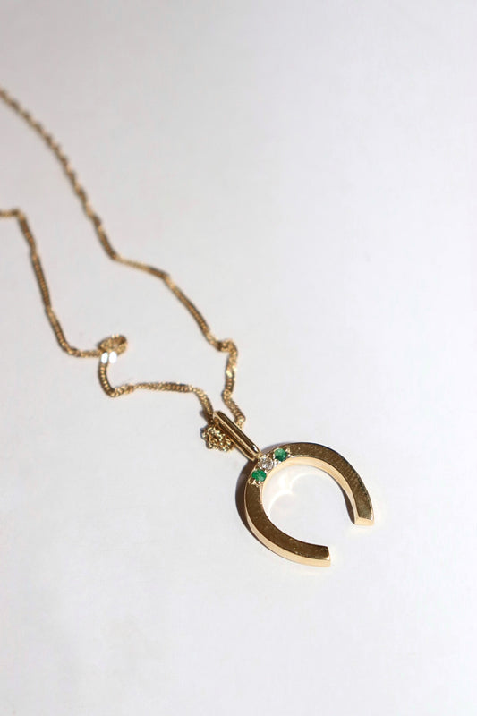 Herradura oro 10k esmeralda y diamante