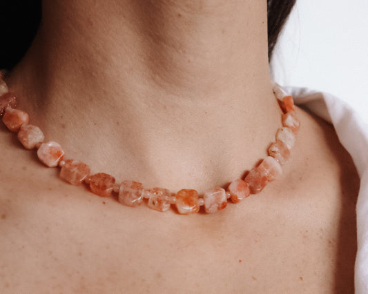 Amuleto collar piedra sol